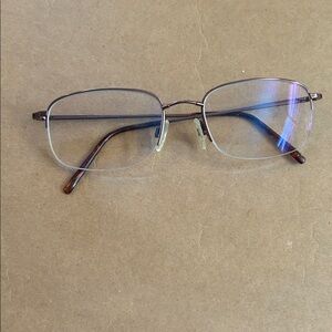 Marchon Rimless Rectangular copper Eyeglasses